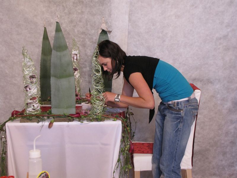 A student during the competition working on the Table decoration on the occasion of a rubious wedding celebration